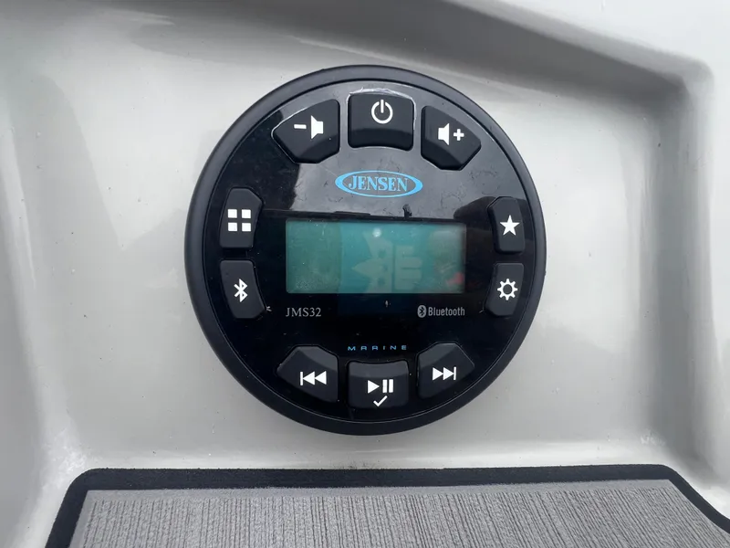Slide: The Image of Jensen marine audio system on 2022 Starcraft SVX 191 OB boat dashboard. - 10