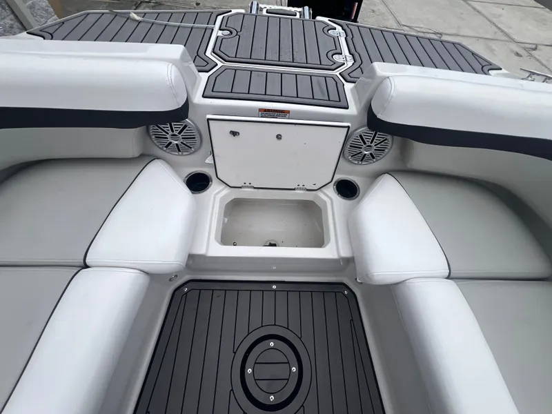 Slide: The Image of Interior of 2022 Starcraft SVX 191 OB boat with seating and storage compartments. - 17