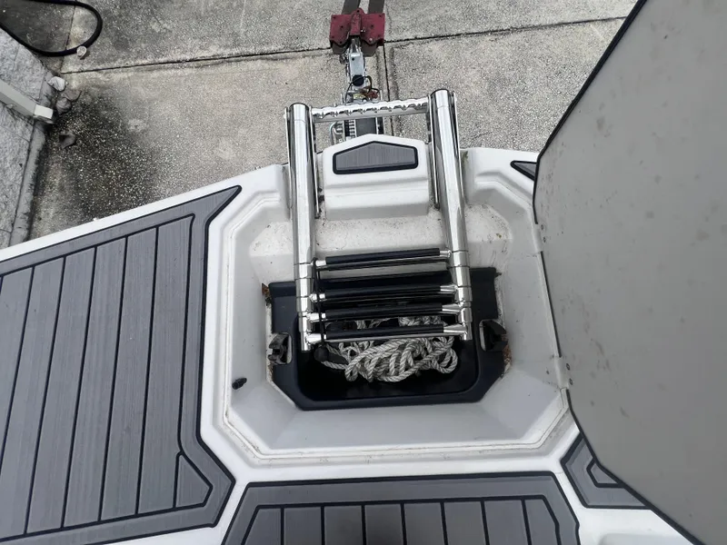 Slide: The Image of 2022 Starcraft SVX 191 OB boat ladder and rope storage compartment. - 18