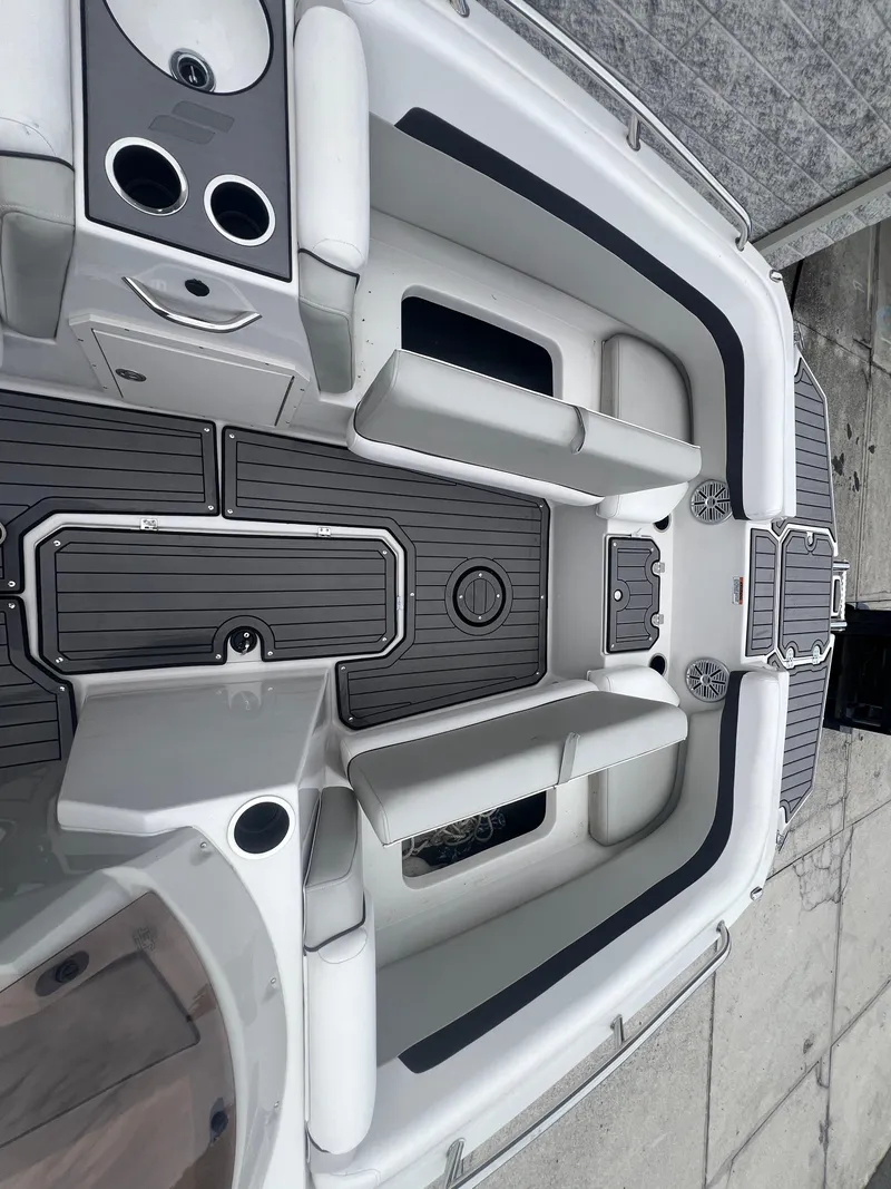 Slide: The Image of 2022 Starcraft SVX 191 OB boat interior with seating and cup holders. - 19