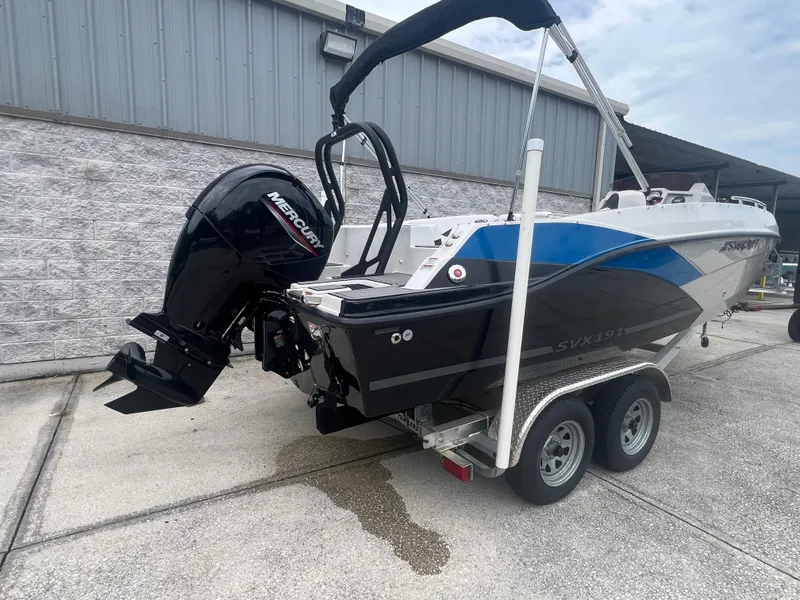 Slide: The Image of 2022 Starcraft SVX 191 OB boat with Mercury outboard motor on a trailer. - 3