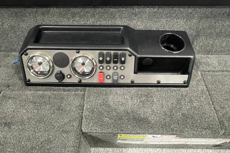 Slide: The Image of Control panel of 2026 Alumacraft Voyageur 175 Tiller boat with gauges and switches. - 10