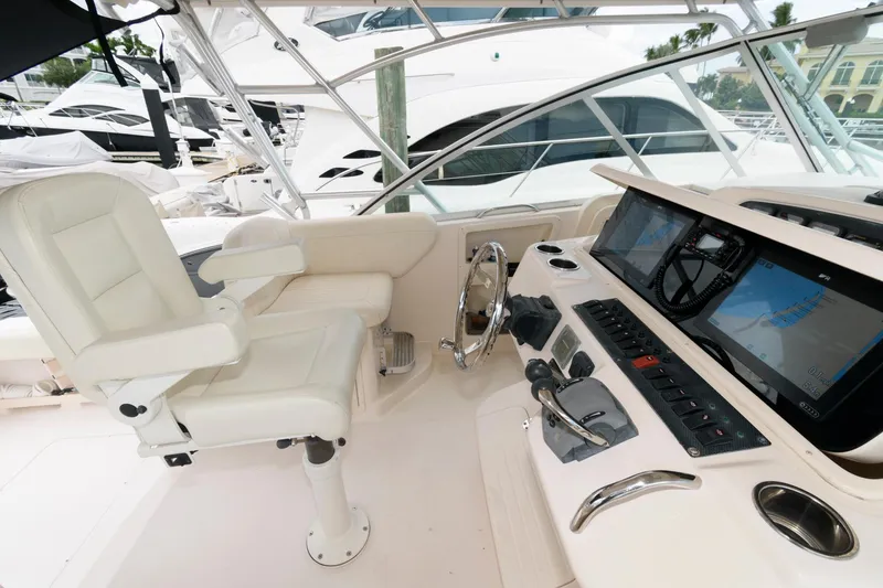 Slide: The Image of 2007 Grady-White Express 360 helm with modern controls and comfortable seating. - 14