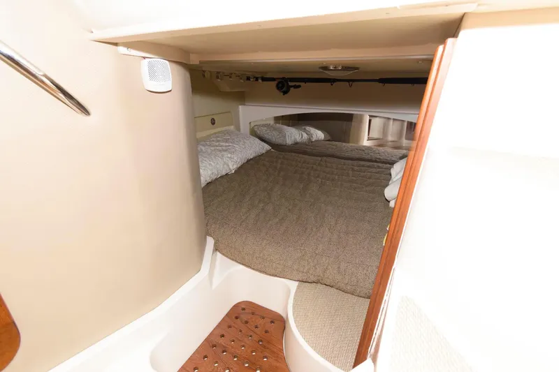 Slide: The Image of Interior cabin of 2007 Grady-White Express 360 with cozy sleeping area. - 24
