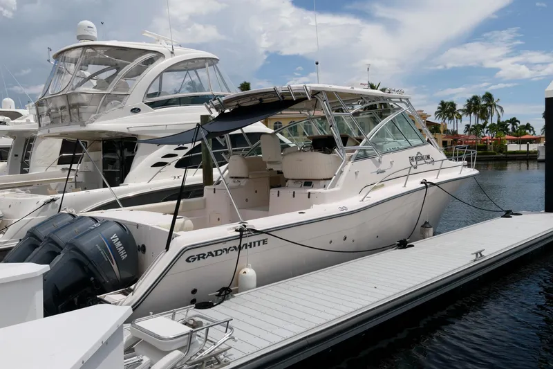 Slide: The Image of 2007 Grady-White Express 360 boat docked at marina with Yamaha engines. - 6