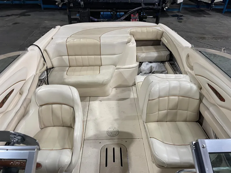 Slide: The Image of 1995 Sea Ray Signature Select boat interior with white leather seating and spacious layout. - 15