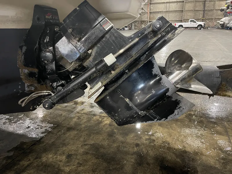 Slide: The Image of 1995 Sea Ray Signature Select boat propeller and drive system in a warehouse setting. - 22