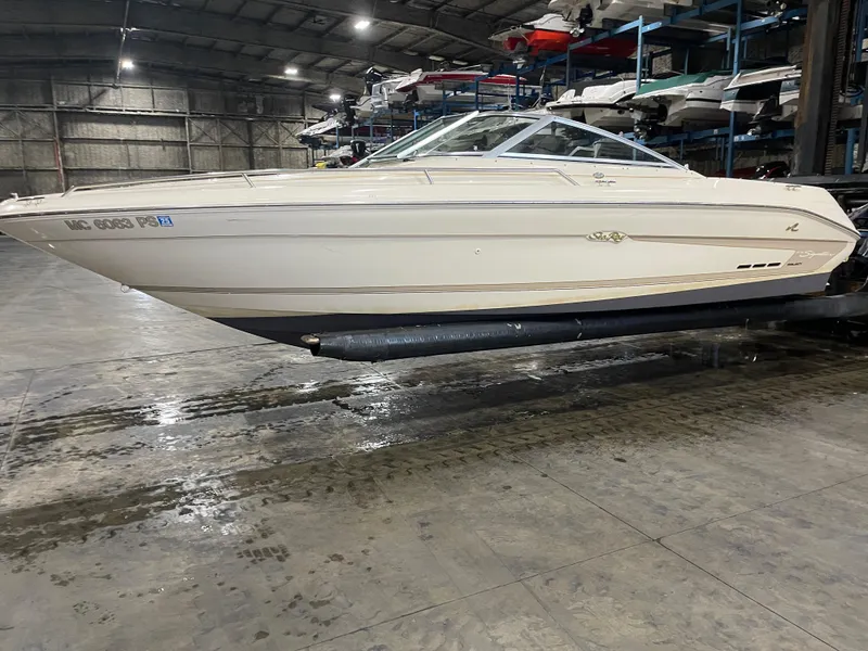 Slide: The Image of 1995 Sea Ray Signature Select boat in indoor storage facility. - 4