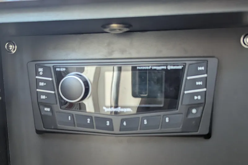 Slide: The Image of Control panel of a 2017 Sea Ray Sundancer 280 boat, featuring audio system interface. - 30