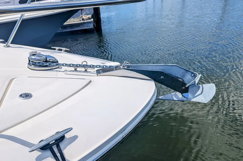 Slide: The Image of Bow of 2017 Sea Ray Sundancer 280 with anchor and chain over water. - 34