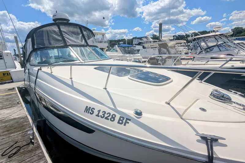 Slide: The Image of 2017 Sea Ray Sundancer 280 docked at marina under blue sky. - 5