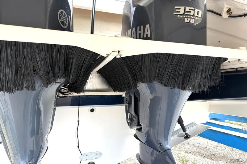 Slide: The Image of Outboard motors on a 2013 Pursuit 365i Sport Coupe with Yamaha 350 V8 engines. - 26