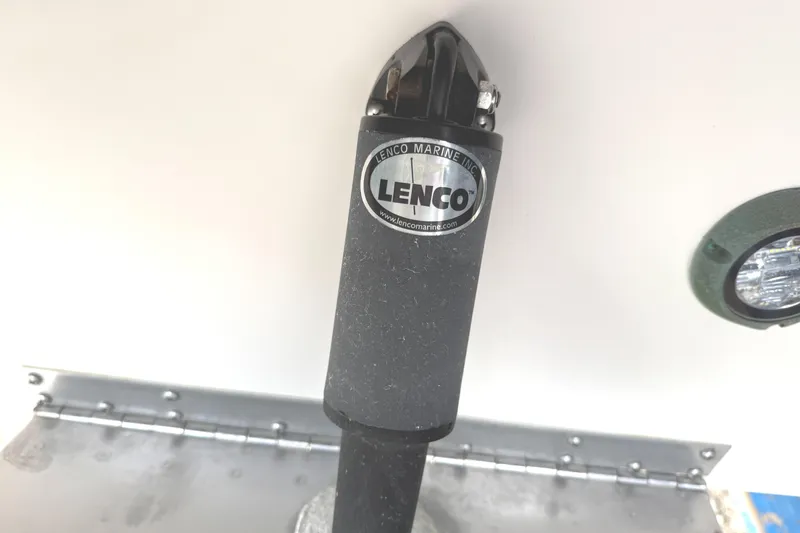 Slide: The Image of Lenco Marine actuator on 2013 Pursuit 365i Sport Coupe boat. - 30