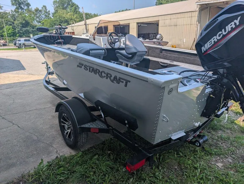 Slide: The Image of 2026 Starcraft 166 Starfish boat on trailer with Mercury outboard motor. - 4