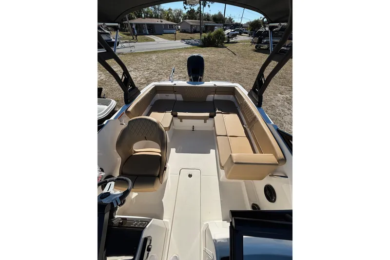 Slide: The Image of 2025 Bayliner VR4 Bowrider OB cockpit with steering wheel and seating. - 9