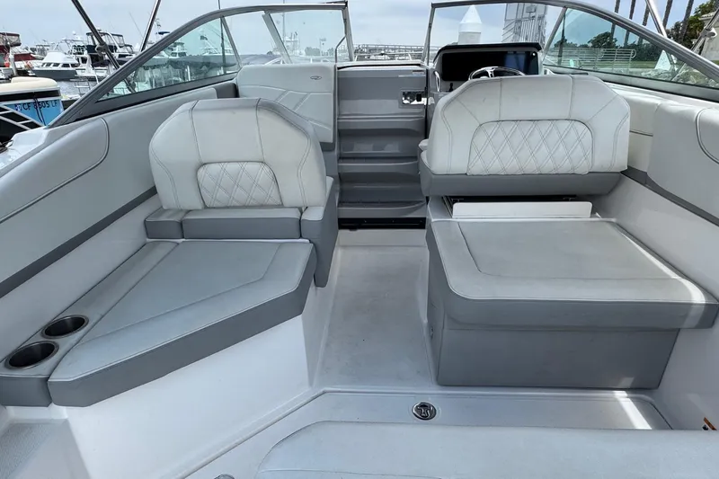 Slide: The Image of 2023 Regal 26 XO boat interior with luxurious seating and modern design. - 5