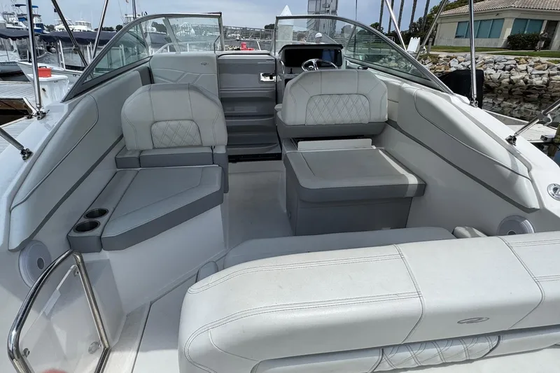 Slide: The Image of 2023 Regal 26 XO boat interior with luxurious seating and modern design. - 6