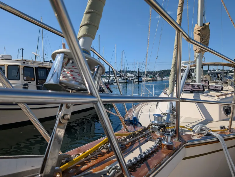 Slide: The Image of Sailboat Island Packet 35, 1994 model, docked in a marina with clear blue skies. - 13
