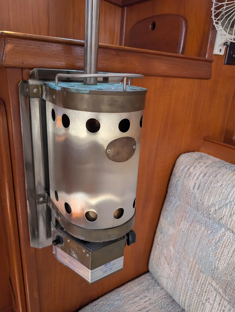 Slide: The Image of Stainless steel heater inside 1994 Island Packet 35 sailboat cabin. - 44
