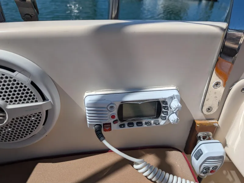 Slide: The Image of 1994 Island Packet 35 boat radio and speaker system on deck. - 45