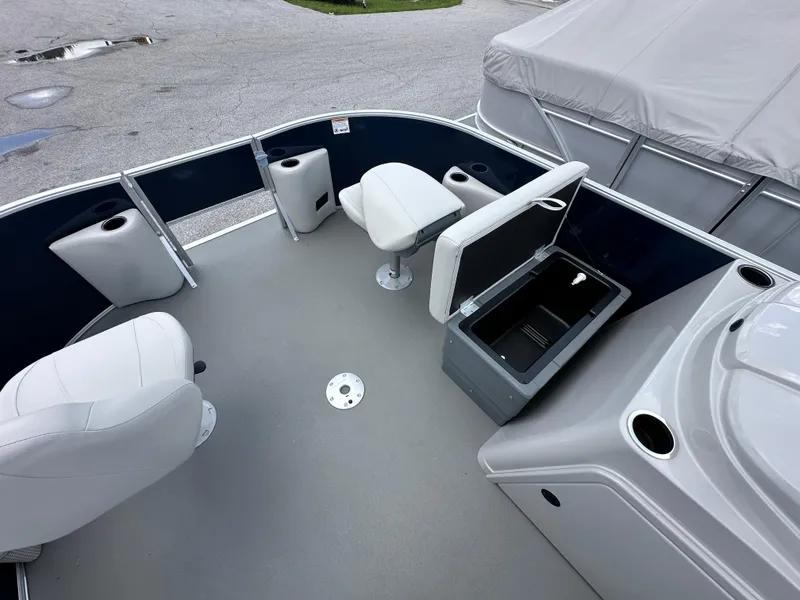 Slide: The Image of 2026 Sylvan Mirage Fish 820 Party Fish boat interior with seating and storage. - 12