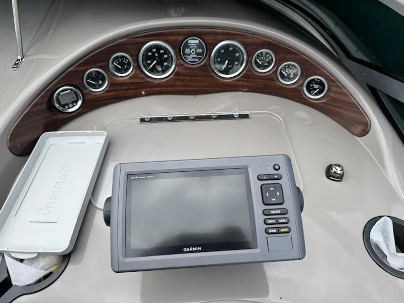 Slide: The Image of Dashboard of 2001 Four Winns 248 Vista boat with Garmin GPS and gauges. - 19