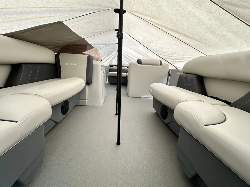 Slide: The Image of Interior of 2025 Sylvan Mirage 818 Cruise pontoon boat with beige seating and canopy. - 17