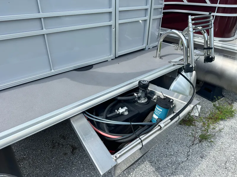 Slide: The Image of 2025 Sylvan Mirage 818 Cruise pontoon boat with visible fuel system and ladder. - 4