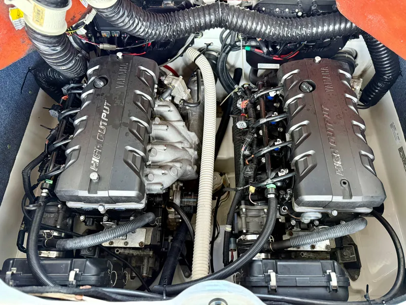 Slide: The Image of 2018 Yamaha Boats 242 Limited S E-Series engine compartment with dual high-output engines. - 11