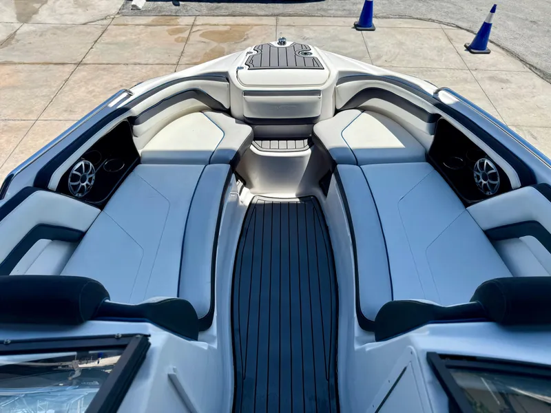 Slide: The Image of 2018 Yamaha Boats 242 Limited S E-Series interior with spacious seating and sleek design. - 6