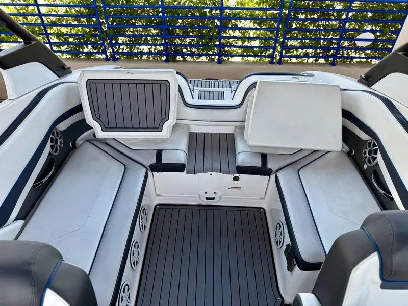Slide: The Image of 2018 Yamaha Boats 242 Limited S E-Series interior with sleek seating and modern design. - 9