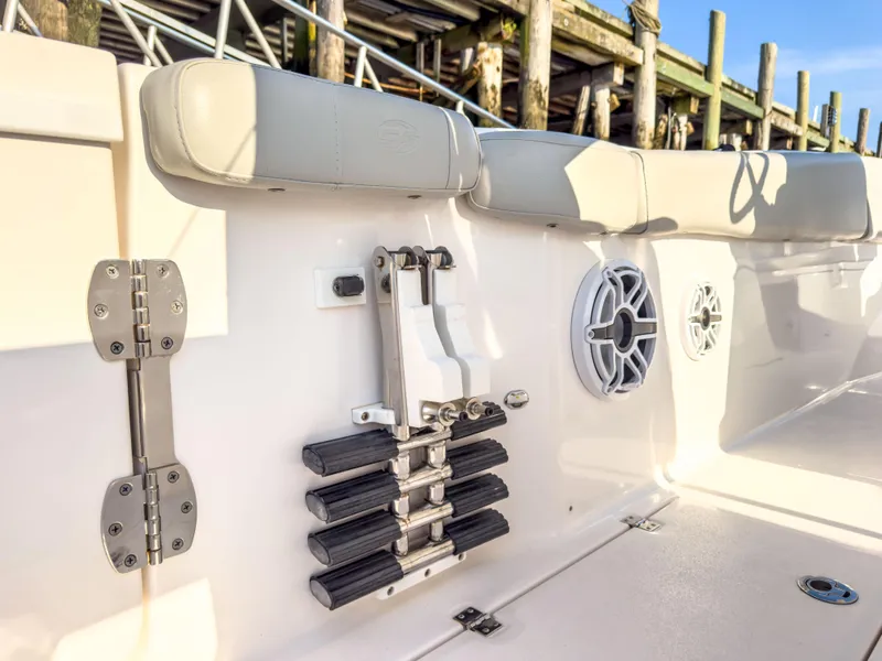 Slide: The Image of 2022 Sea Fox 288 Commander boat interior with seating, speakers, and ladder. - 22