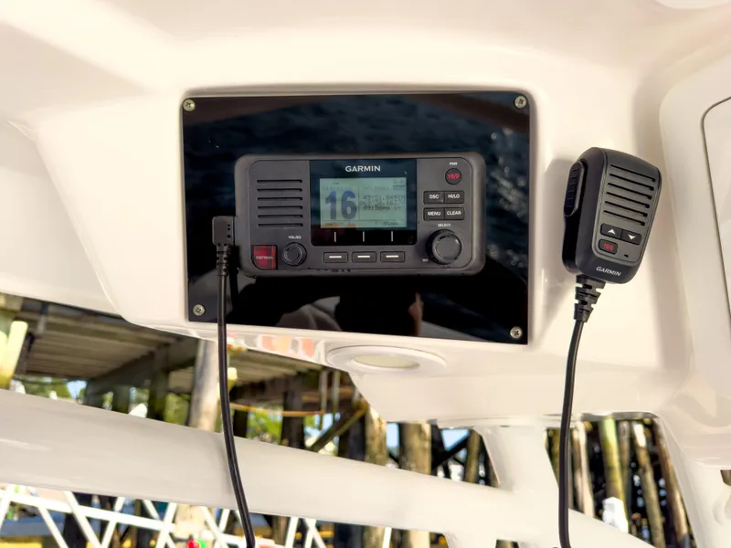 Slide: The Image of Garmin marine radio on 2022 Sea Fox 288 Commander boat, under a canopy. - 30