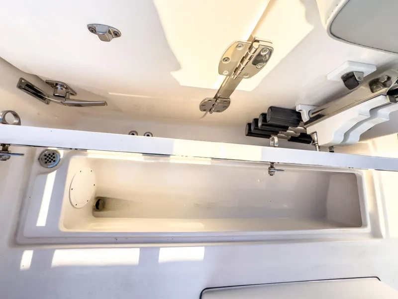 Slide: The Image of 2022 Sea Fox 288 Commander boat storage compartment with stainless steel hardware. - 34