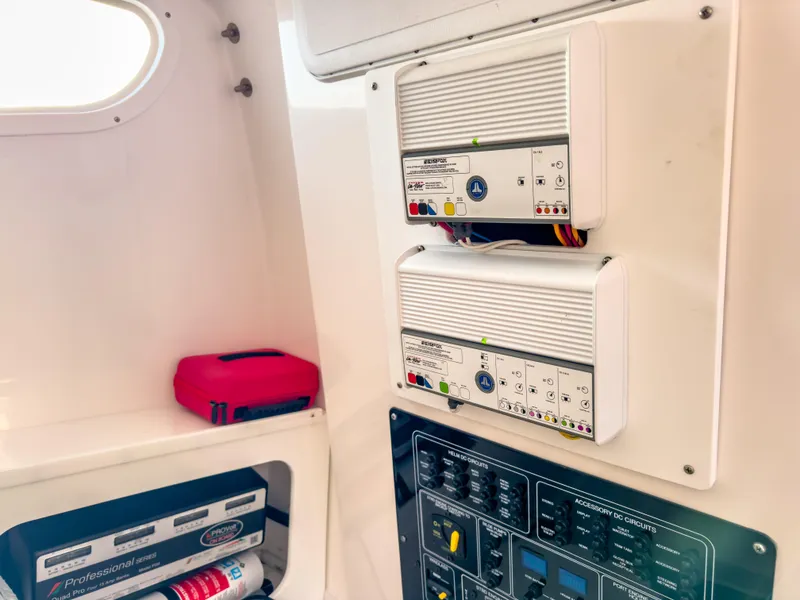 Slide: The Image of Electrical panel and equipment inside a 2022 Sea Fox 288 Commander boat. - 44
