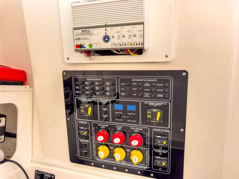 Slide: The Image of Control panel of a 2022 Sea Fox 288 Commander boat, featuring various switches and circuits. - 45