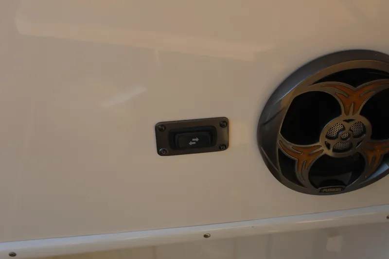 Slide: The Image of Speaker and control switch on 2015 Regal 35 Sport Coupe boat. - 30