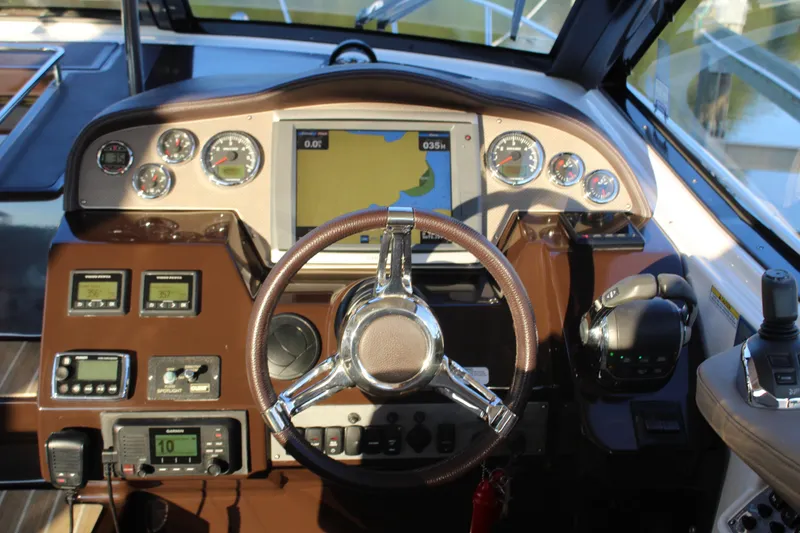 Slide: The Image of 2015 Regal 35 Sport Coupe dashboard with navigation and control instruments. - 39