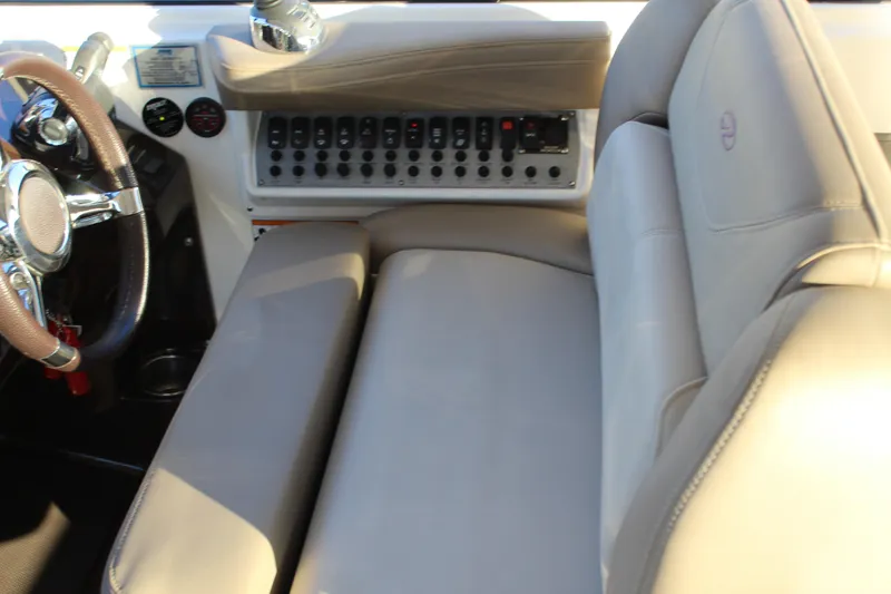 Slide: The Image of Interior of 2015 Regal 35 Sport Coupe with steering wheel and control panel. - 45