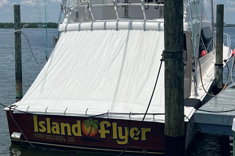 Slide: The Image of Cabo 40 Flybridge 2005 boat named "Island Flyer" docked at Ono Island, AL. - 20