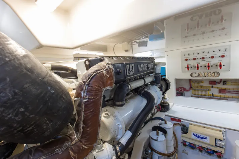 Slide: The Image of Engine room of 2005 Cabo 40 Flybridge with CAT Marine Power engine. - 75