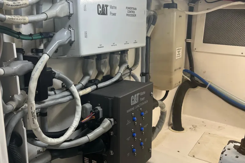 Slide: The Image of Engine room of 2005 Cabo 40 Flybridge with CAT Marine Power components. - 91