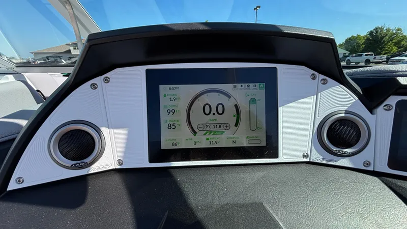 Slide: The Image of Dashboard of 2025 MB B52 25 Alpha boat with digital display and speakers. - 10