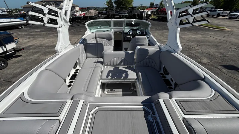 Slide: The Image of 2025 MB B52 25 Alpha boat interior with gray seating and modern design. - 34