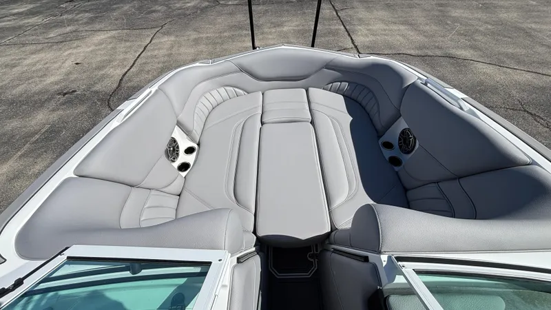 Slide: The Image of Luxurious interior of 2025 MB B52 25 Alpha boat with gray seating and speakers. - 42