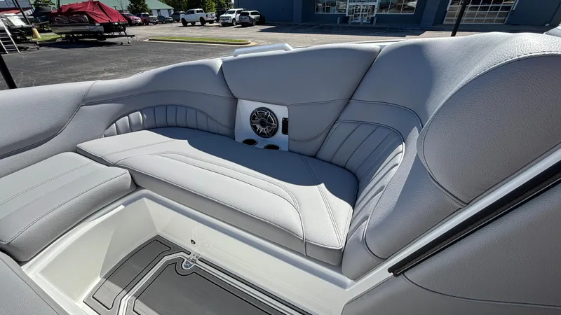 Slide: The Image of Luxurious interior of 2025 MB B52 25 Alpha boat with plush seating and speaker system. - 45