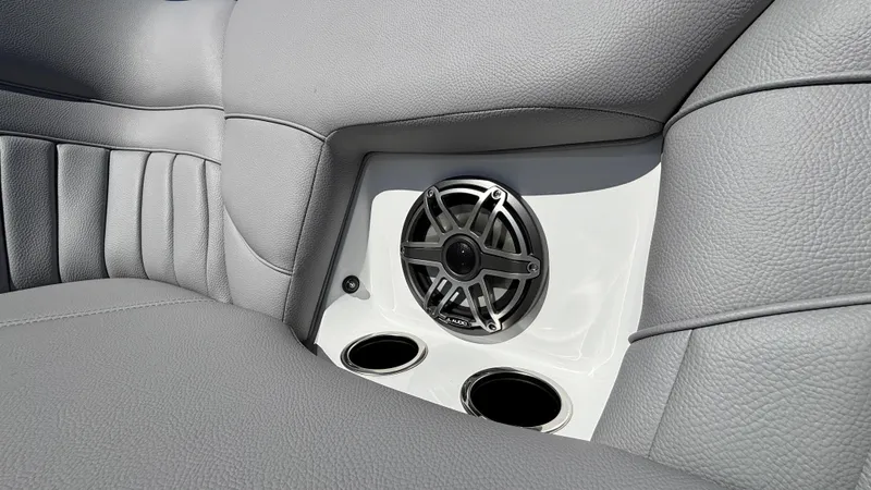 Slide: The Image of Gray leather interior with speaker and cup holders in 2025 MB B52 25 Alpha. - 49