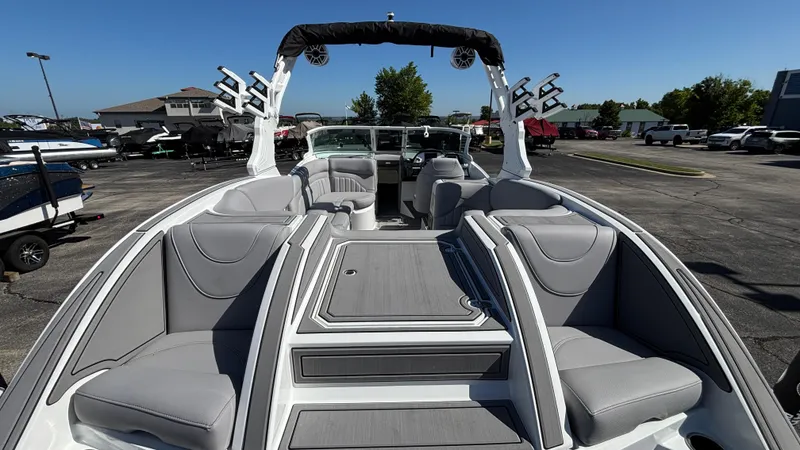 Slide: The Image of 2025 MB B52 25 Alpha boat interior with sleek gray seating and modern design. - 5