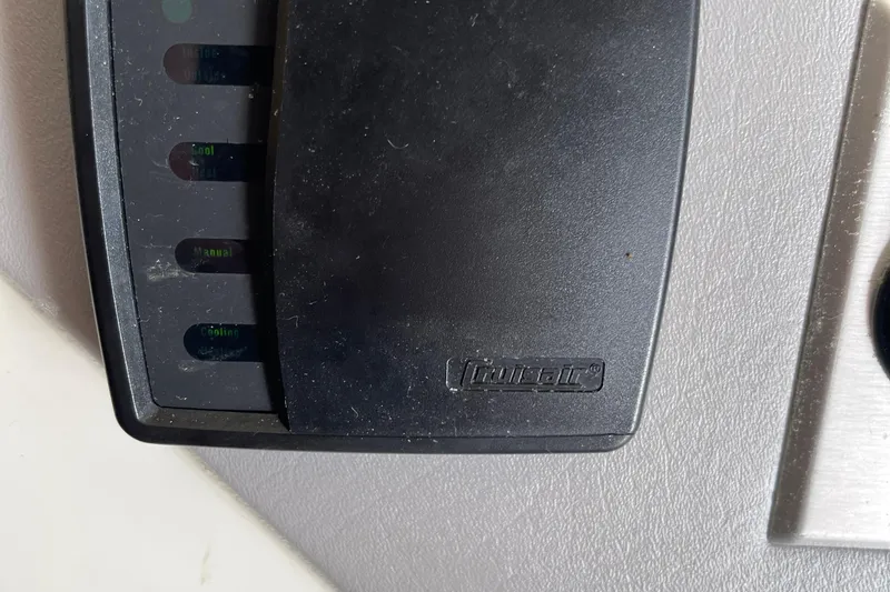 Slide: The Image of Control panel of a 1988 Trojan 12 Meter Convertible boat. - 54