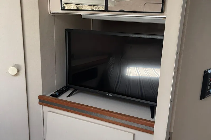 Slide: The Image of Vizio TV in 1988 Trojan 12 Meter Convertible yacht interior. - 47